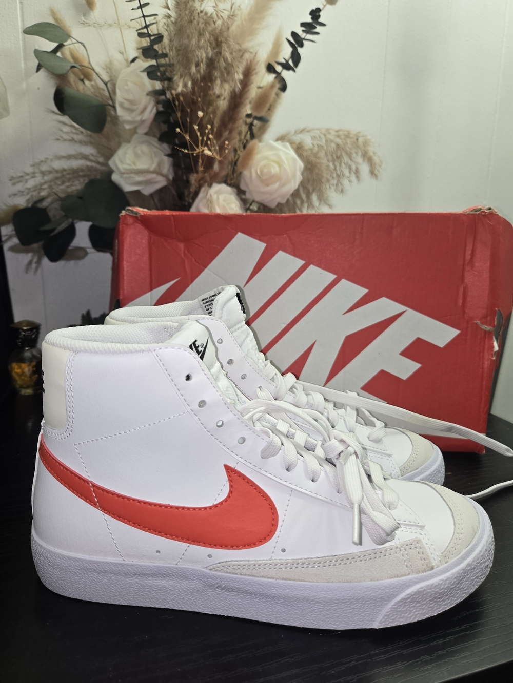 Nike Women's White High-Top Sneakers with Red Swoosh